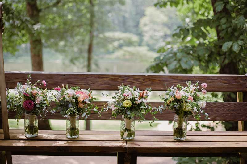 Flower bouquets on a bench